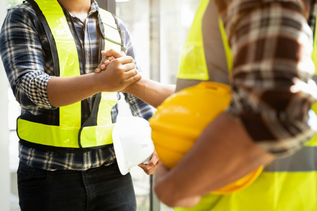 construction worker wearing a protective helmet and vest